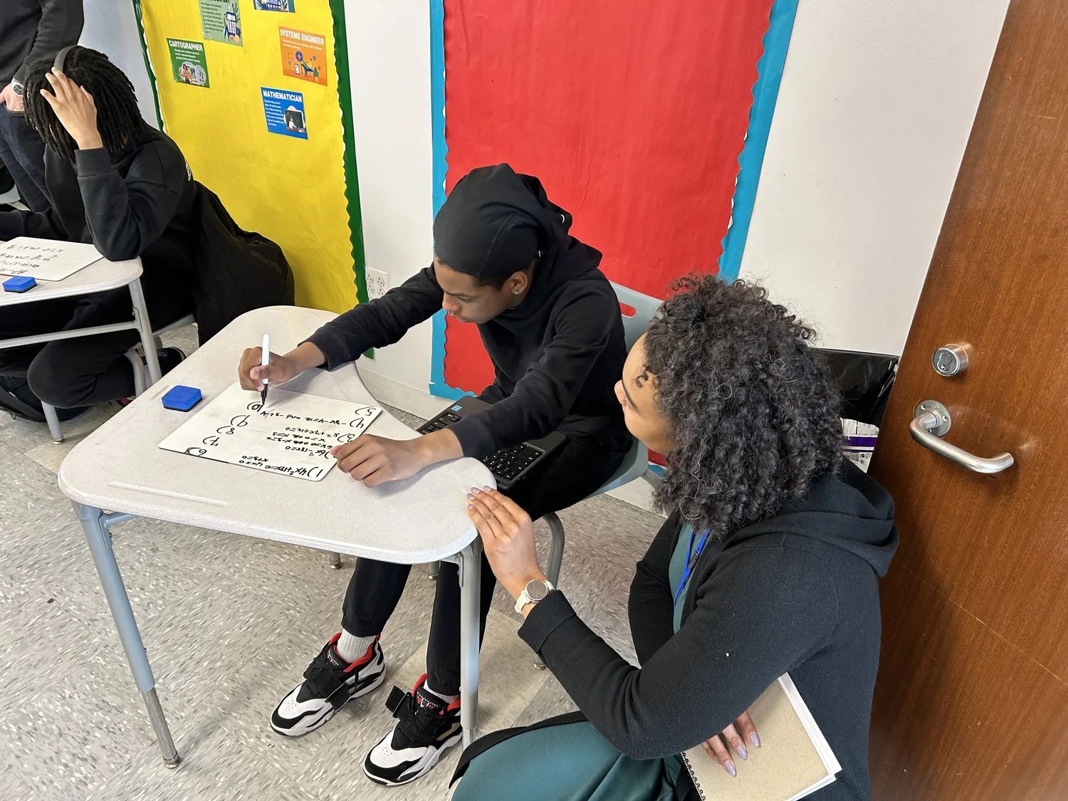 WLA students collaborating on an AI-supported classroom activity
