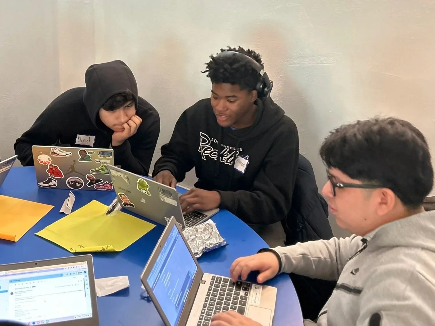 WLA students using laptops during a lesson
